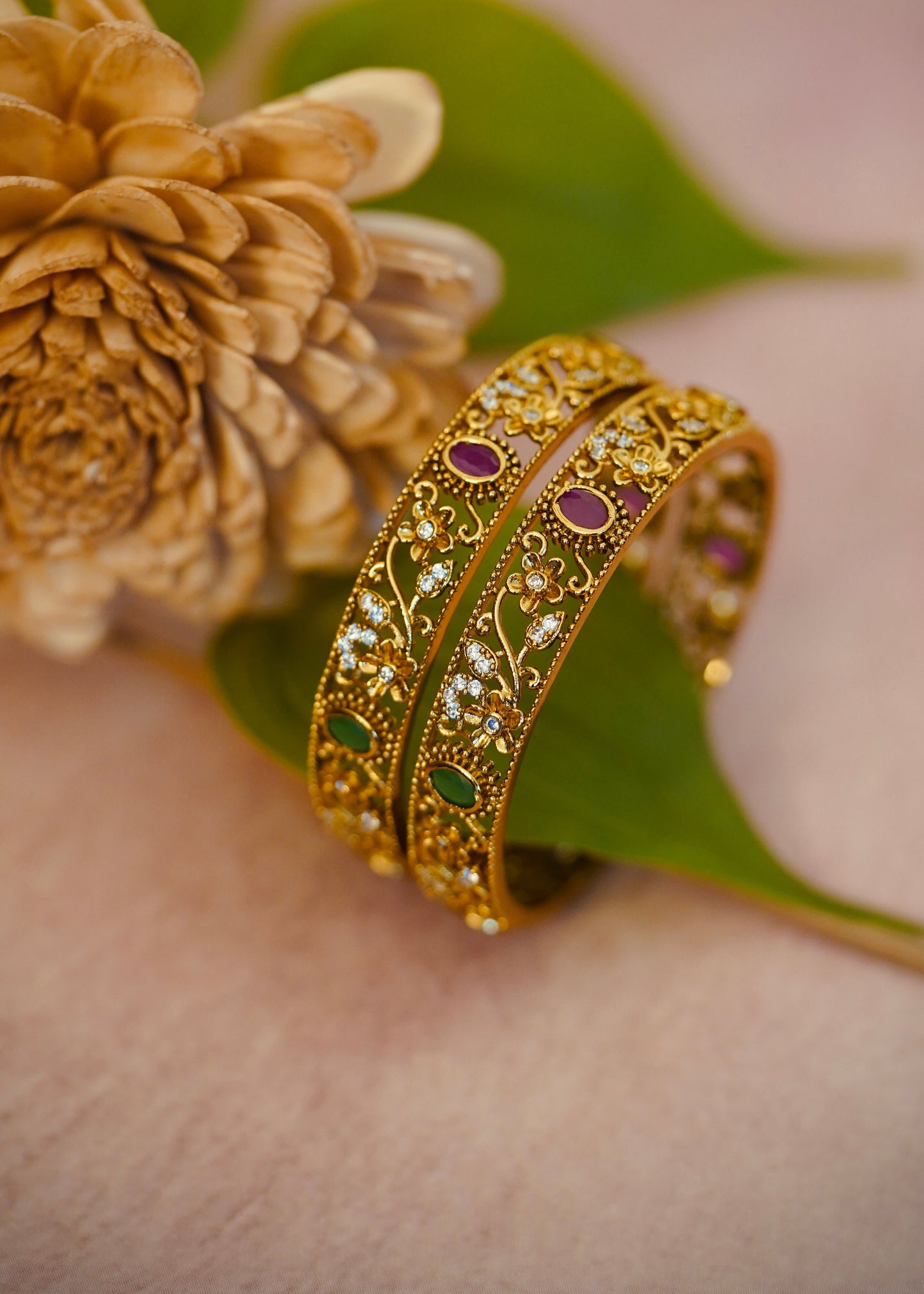 Premium Royal Garden Bangles – Intricate floral vines with red and green gem detailing.