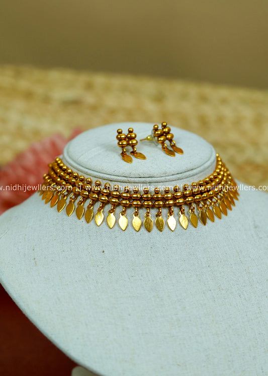 Antique Gold-Tone Beaded Elakkathali Necklace with Layered Leaf-Shaped Fringe-Pallavi