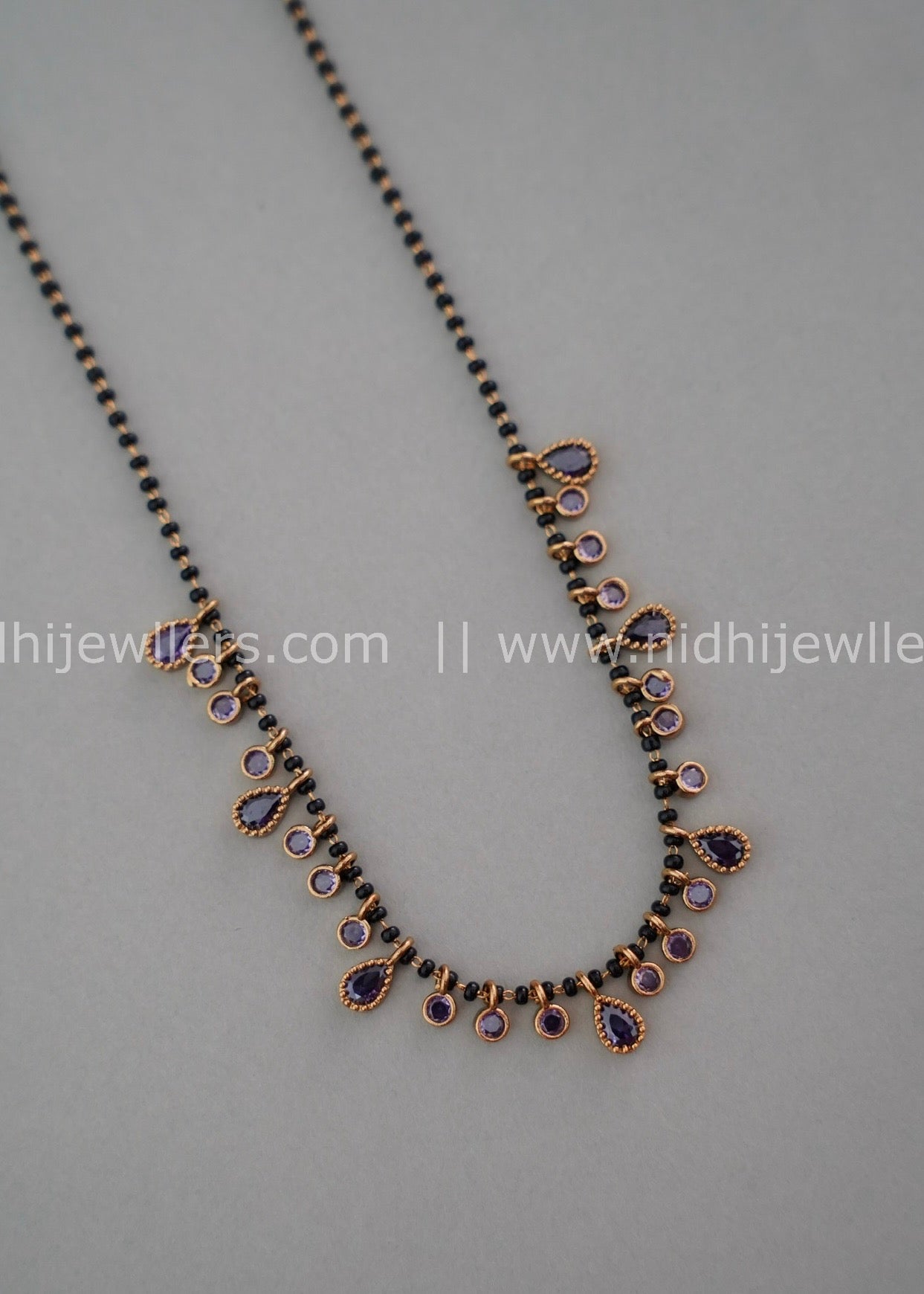 Black beads AD neck piece.