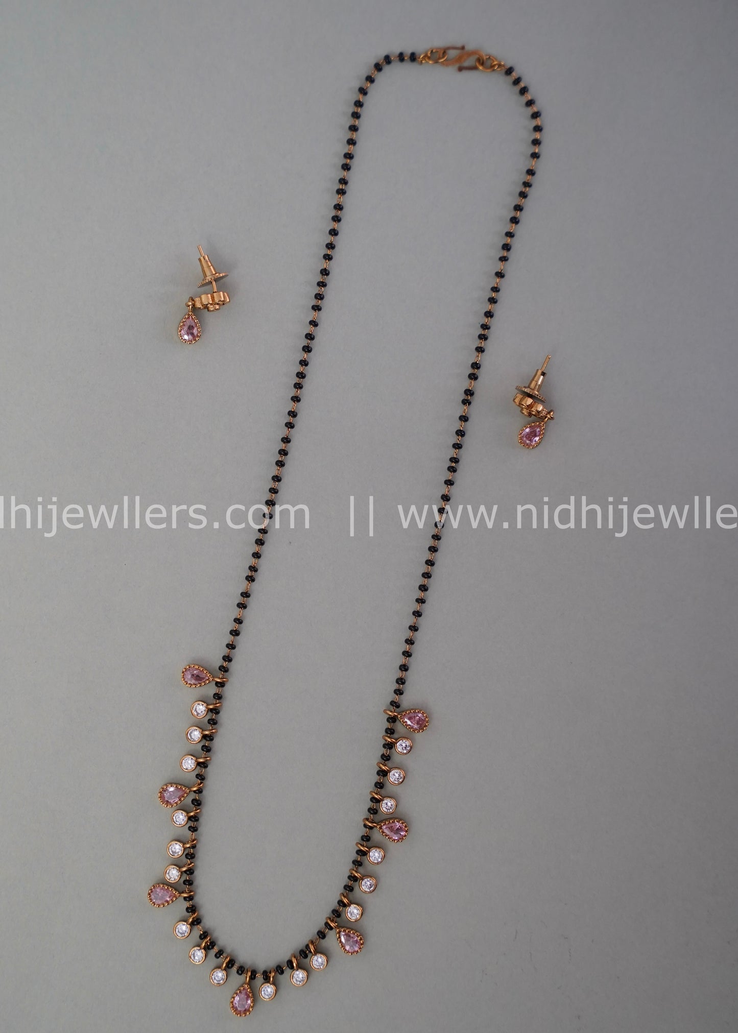 Black beads AD neck piece.