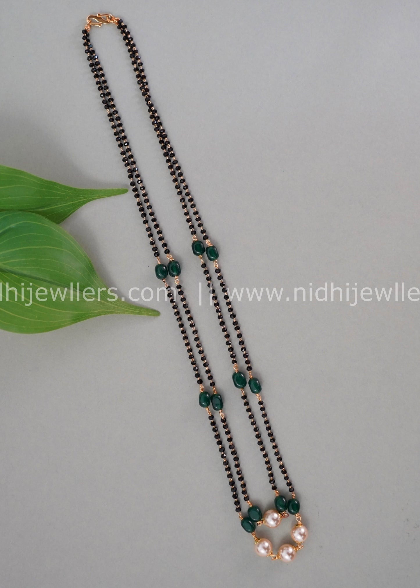Black beads double layered neck piece.
