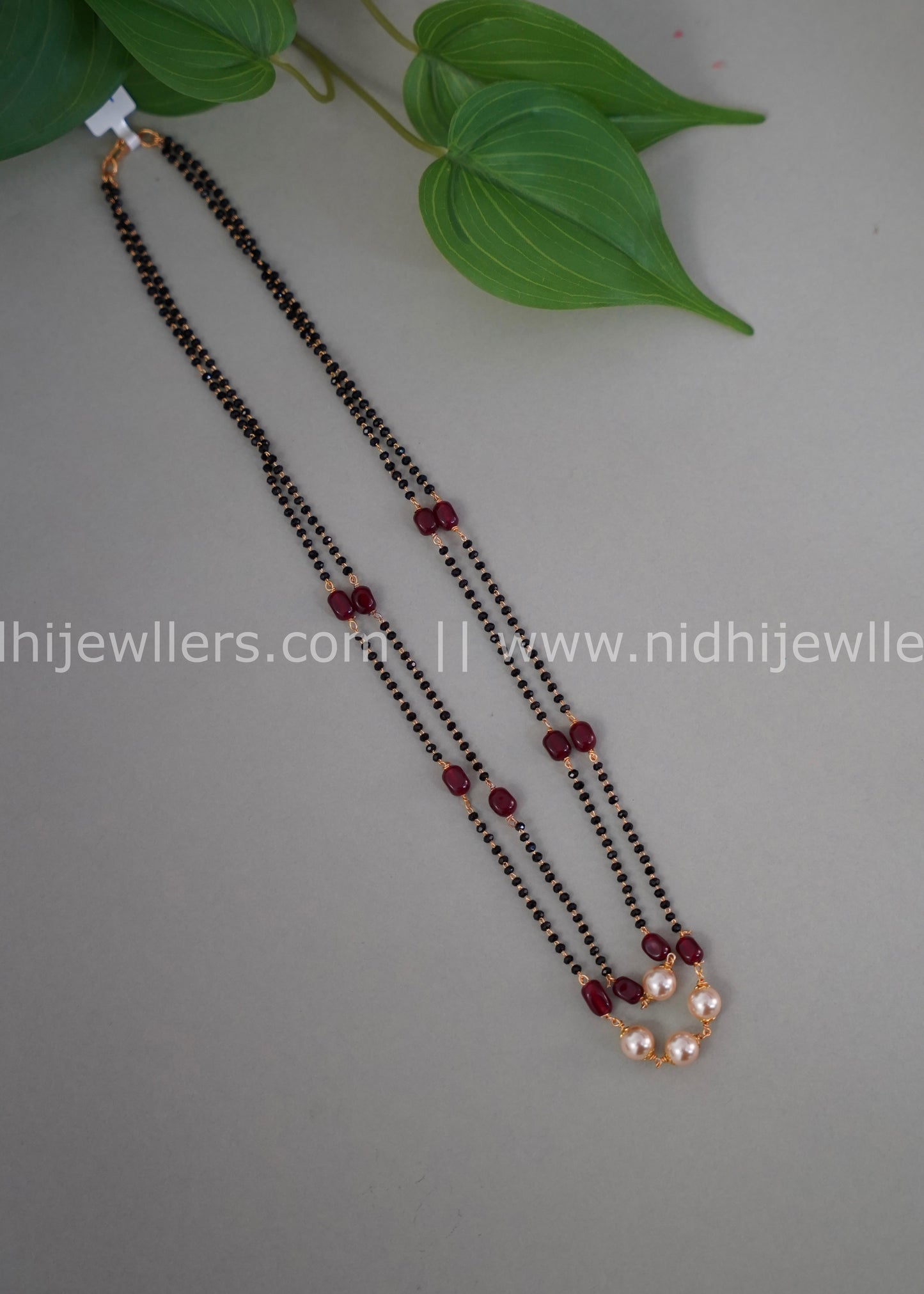 Black beads double layered neck piece.