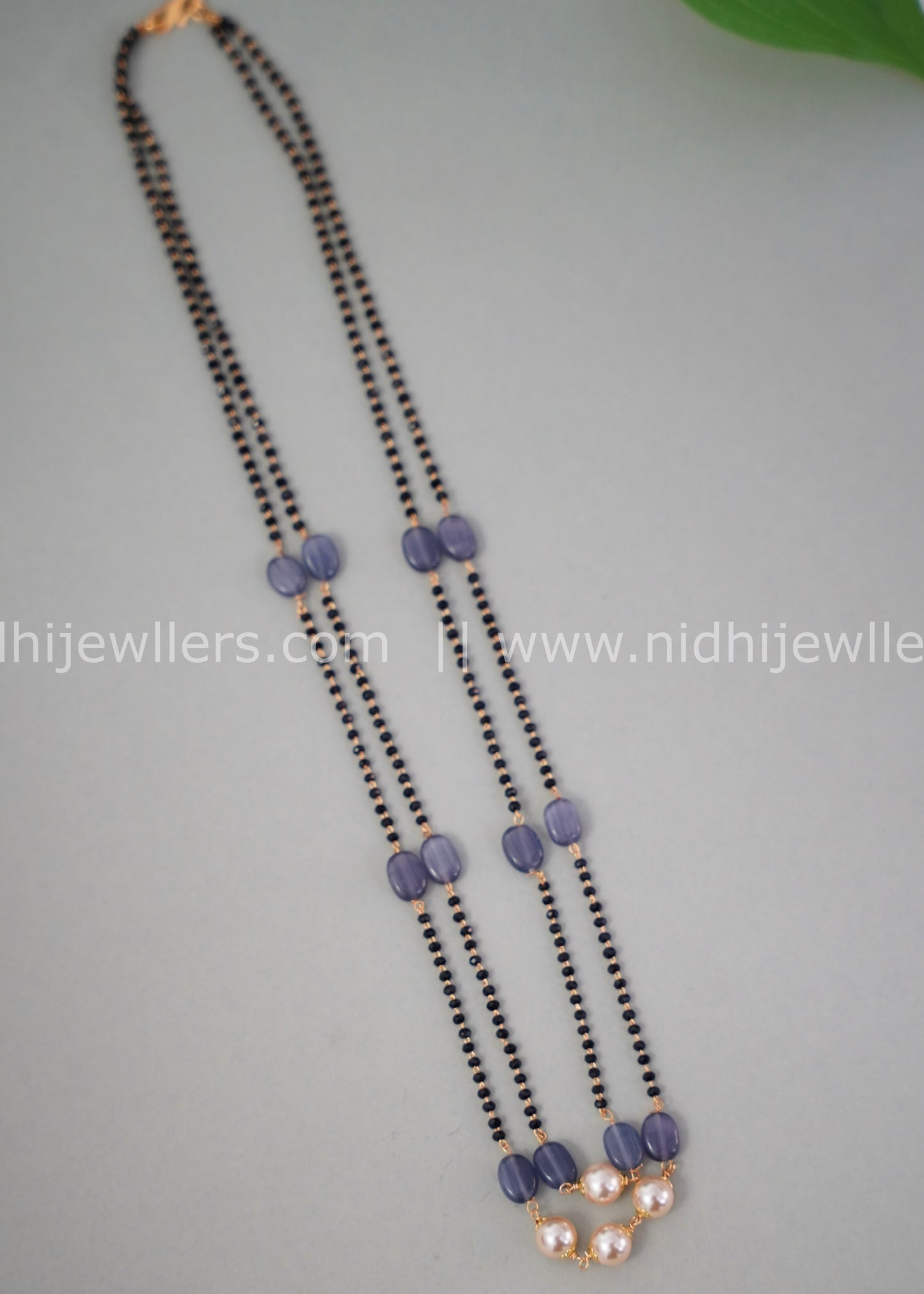 Black beads double layered neck piece.