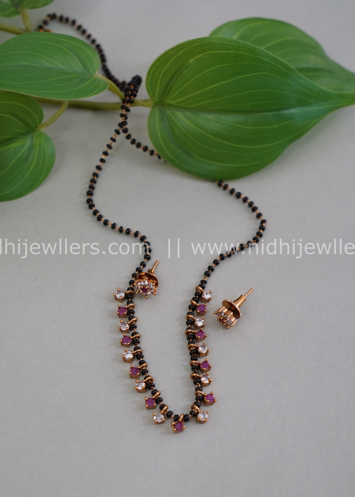 Black beads neck piece ad stone