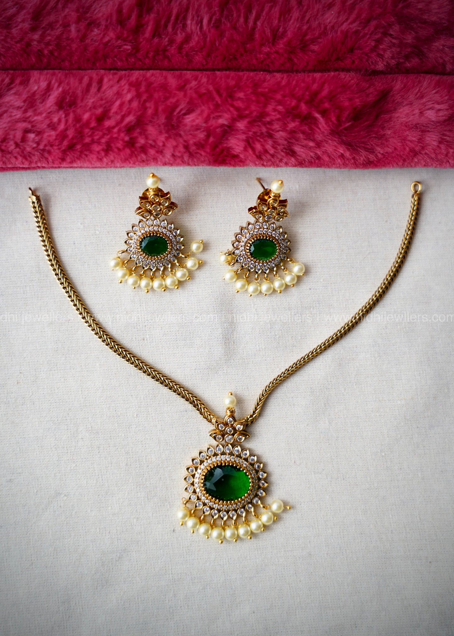 AD premium green stone necklace.