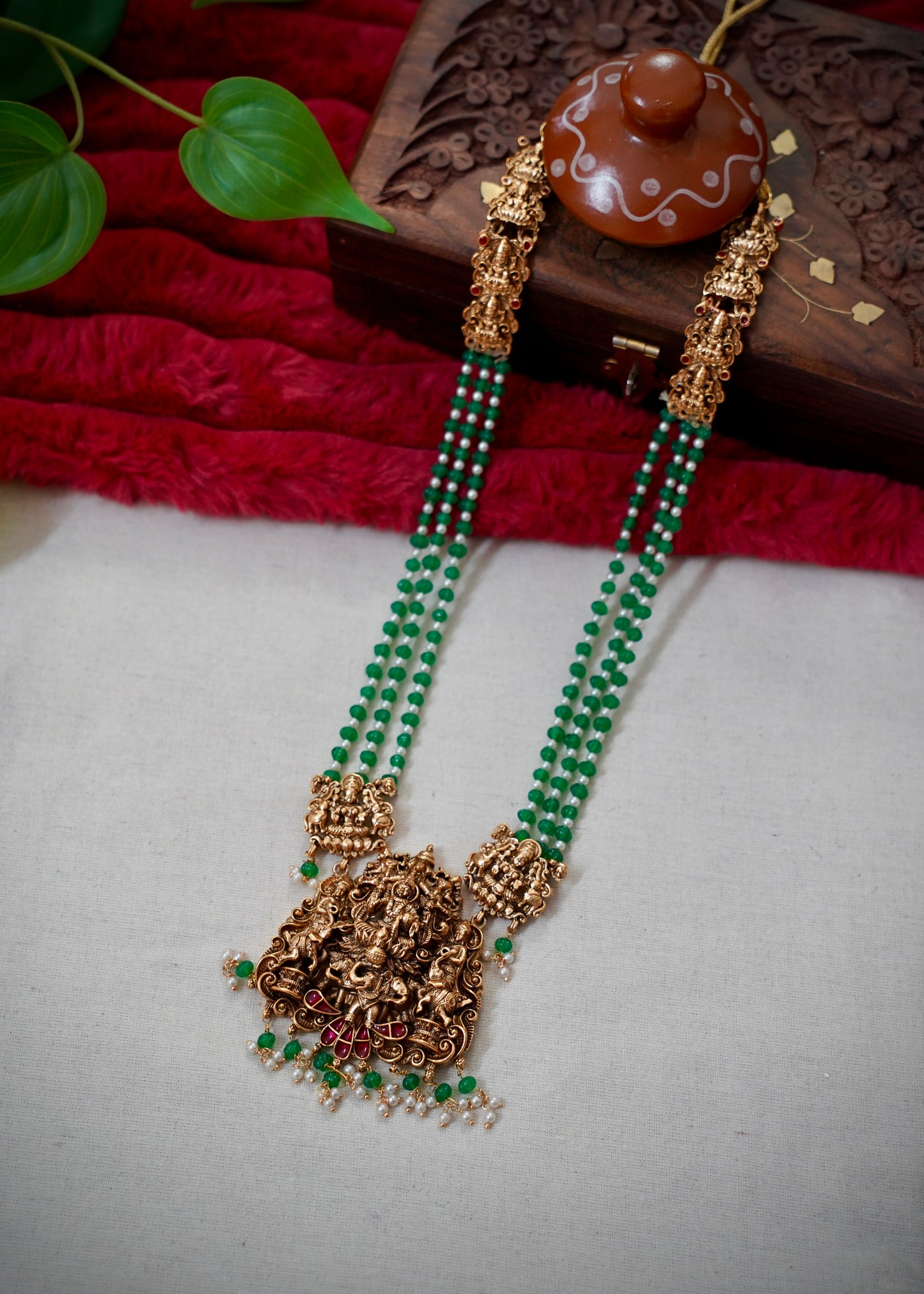 Lakshmi haram with four layer green beads