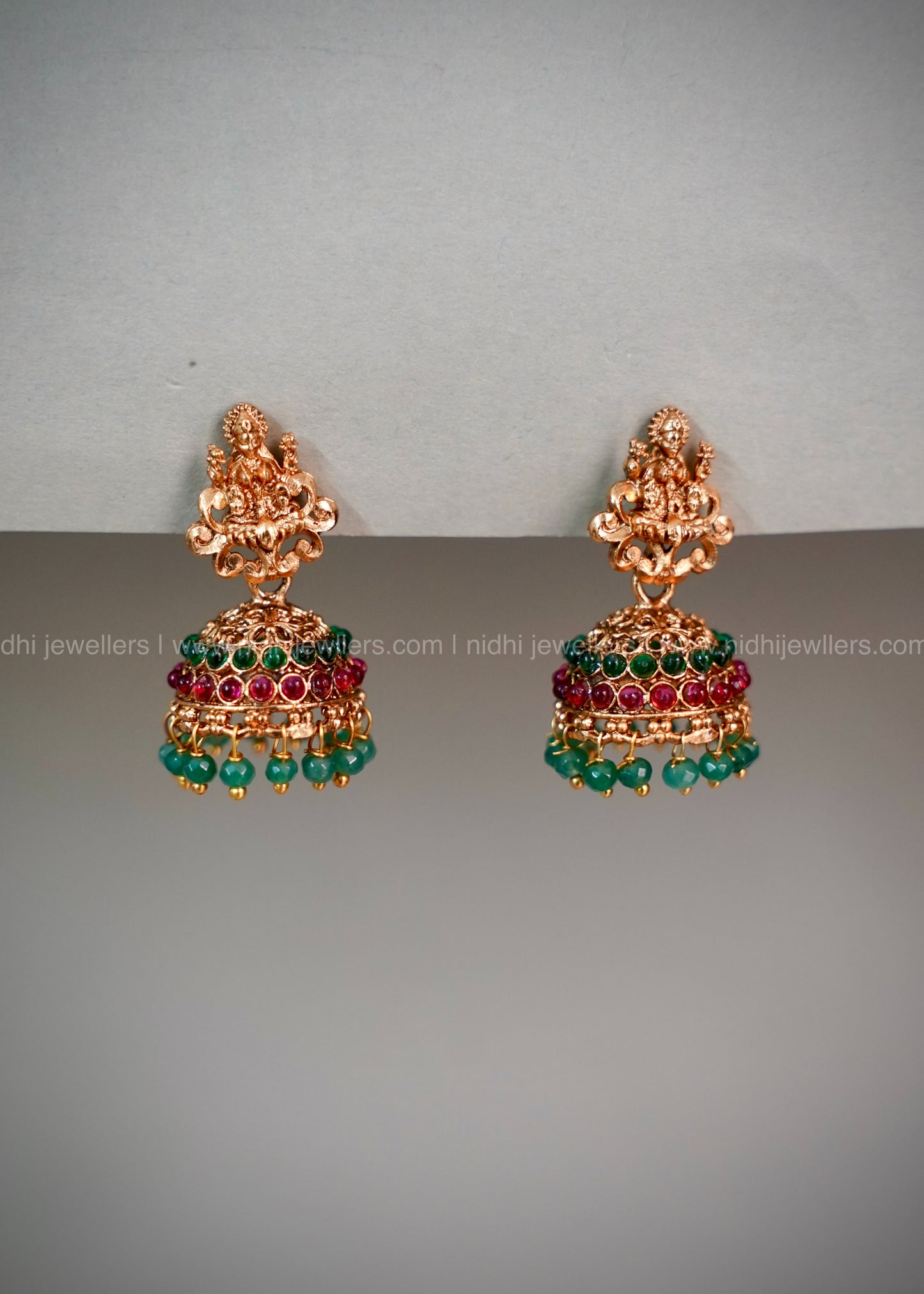 Lakshmi kemp haram with green beads pendant.