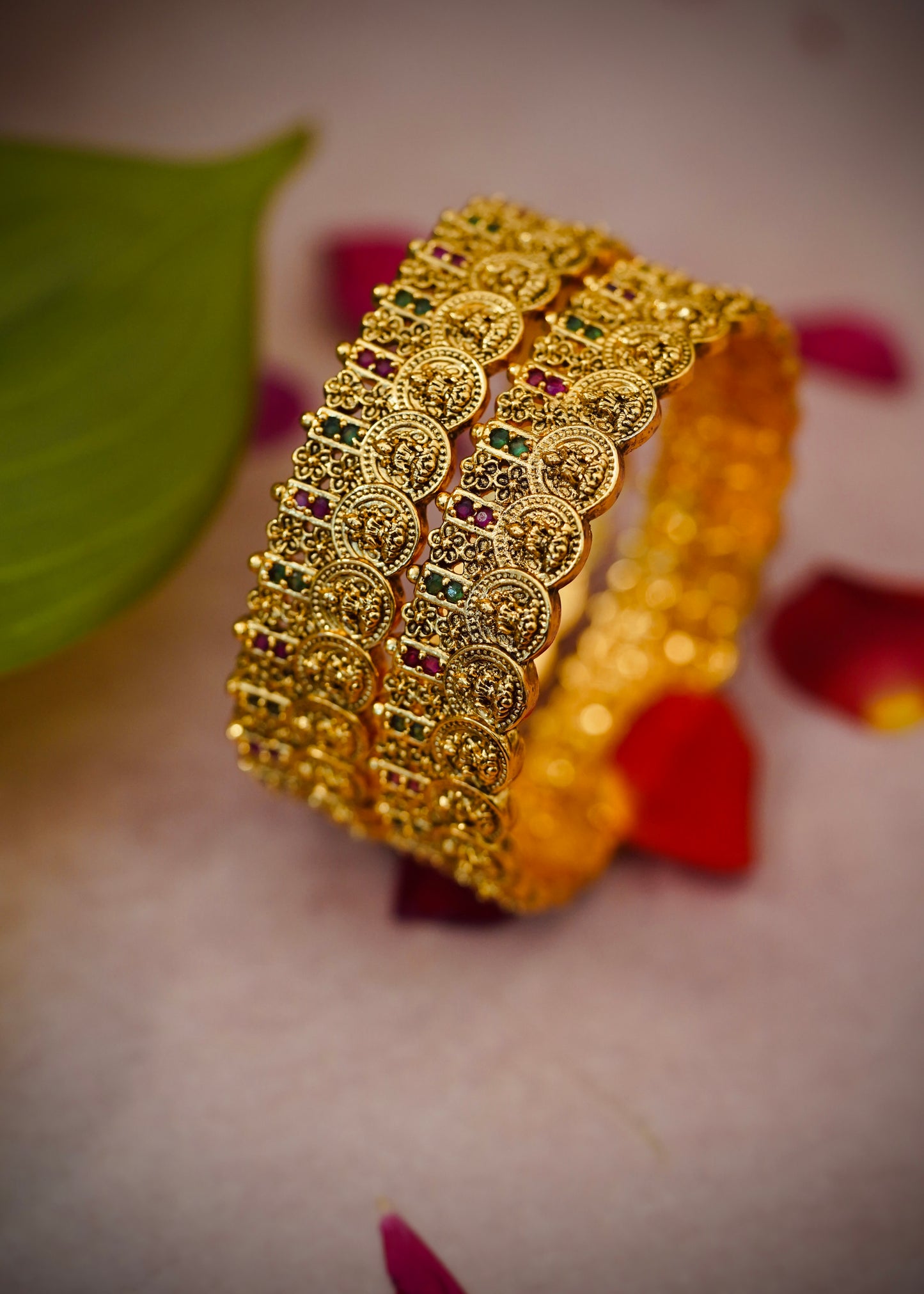 Coin Antique Bangles – Traditional coin-style design with ruby and emerald stonework.