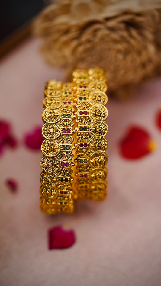 Coin Antique Bangles – Traditional coin-style design with ruby and emerald stonework.
