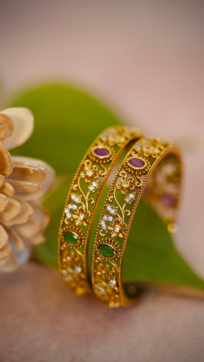 Premium Royal Garden Bangles – Intricate floral vines with red and green gem detailing.