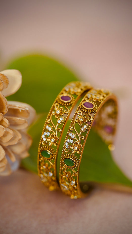 Premium Royal Garden Bangles – Intricate floral vines with red and green gem detailing.