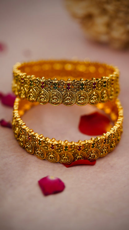 Coin Antique Bangles – Traditional coin-style design with ruby and emerald stonework.