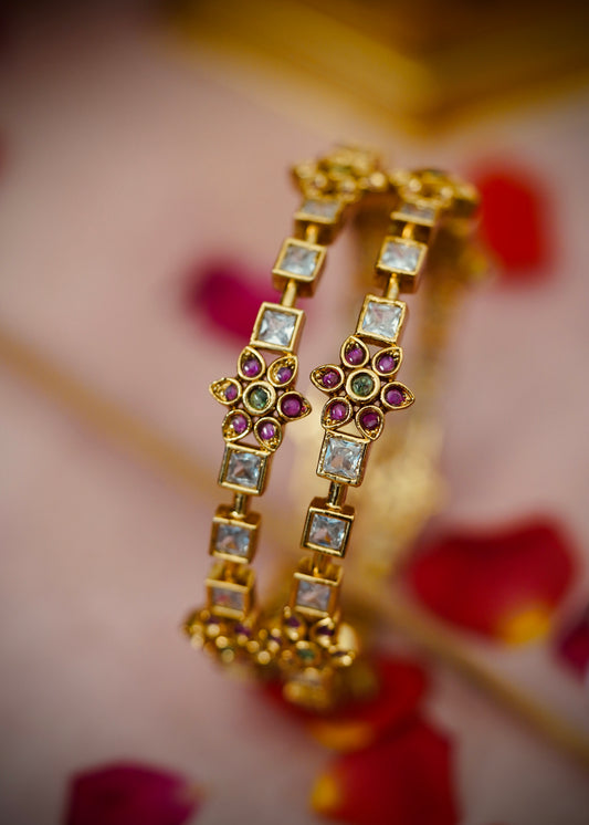 Elegant Kundan Bangles ✨
Adorned with floral detailing & sparkling square-cut kundan stones, these beauties bring the perfect royal charm to your festive look.