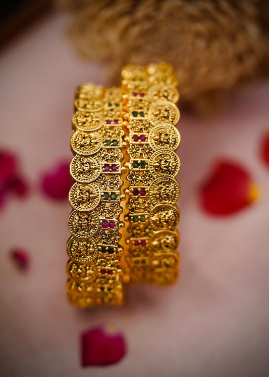 Coin Antique Bangles – Traditional coin-style design with ruby and emerald stonework.