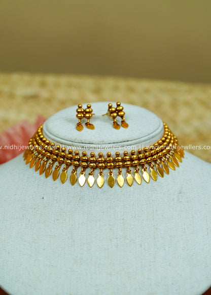 Antique Gold-Tone Beaded Elakkathali Necklace with Layered Leaf-Shaped Fringe-Pallavi