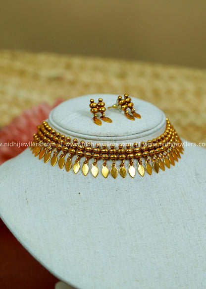 Antique Gold-Tone Beaded Elakkathali Necklace with Layered Leaf-Shaped Fringe-Pallavi