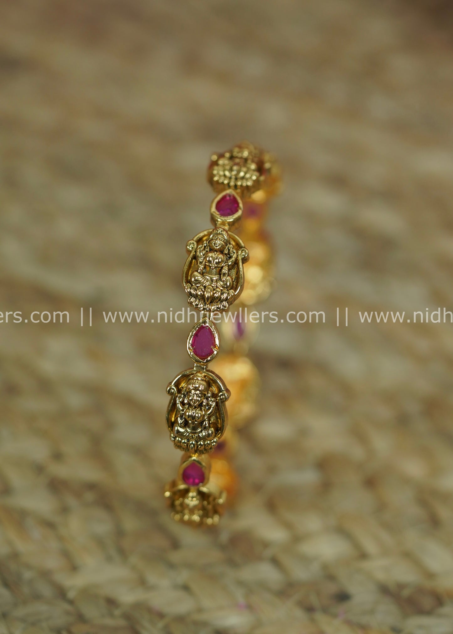 Antique Polished Goddess Lakshmi Temple Bangle with Teardrop Ruby Accents