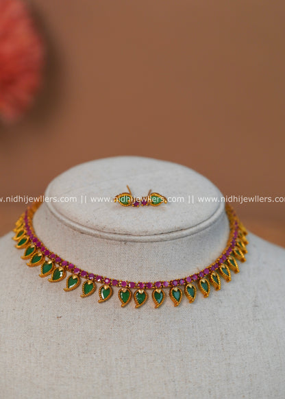Antique Gold-Finish Palakka-Inspired Emerald Mango Choker Set with Ruby Rail - Mayukha