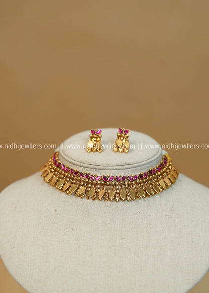 Antique Finish Festive Ruby Elakkathali Choker Set - Yamini