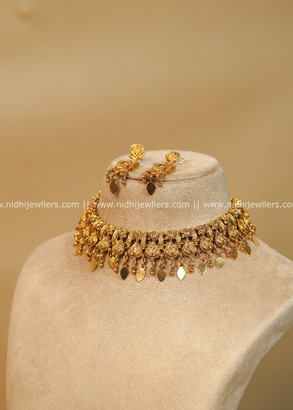 Antique Matte Elakkathali Peacock Shimmer Choker Set - Riya