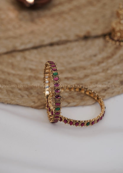 Antique Oval Ruby and Emerald Cabochon Bangles (Pair): Manjari