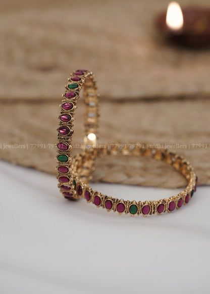 Antique Oval Ruby and Emerald Cabochon Bangles (Pair): Manjari