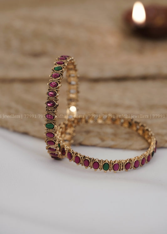 Antique Oval Ruby and Emerald Cabochon Bangles (Pair): Manjari