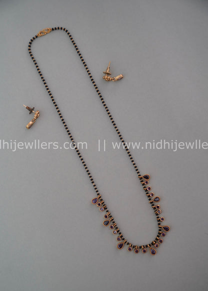 Black beads AD neck piece.