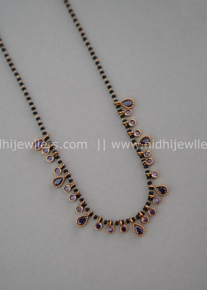 Black beads AD neck piece.