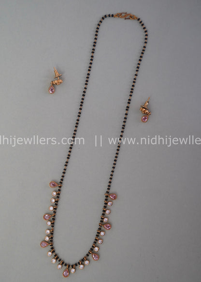 Black beads AD neck piece.