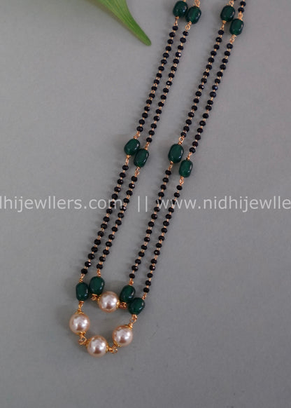 Black beads double layered neck piece.
