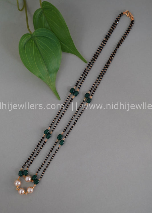 Black beads double layered neck piece.