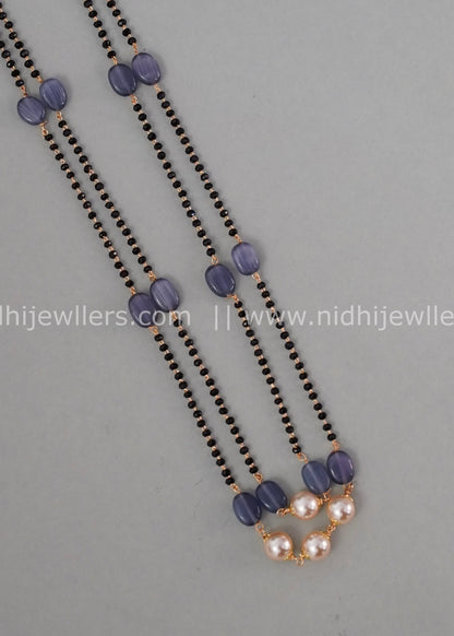 Black beads double layered neck piece.