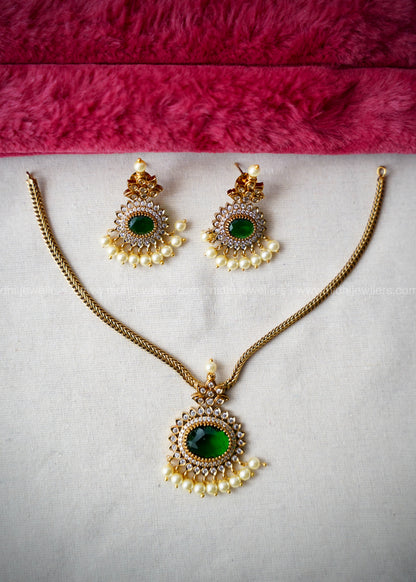 AD premium green stone necklace.