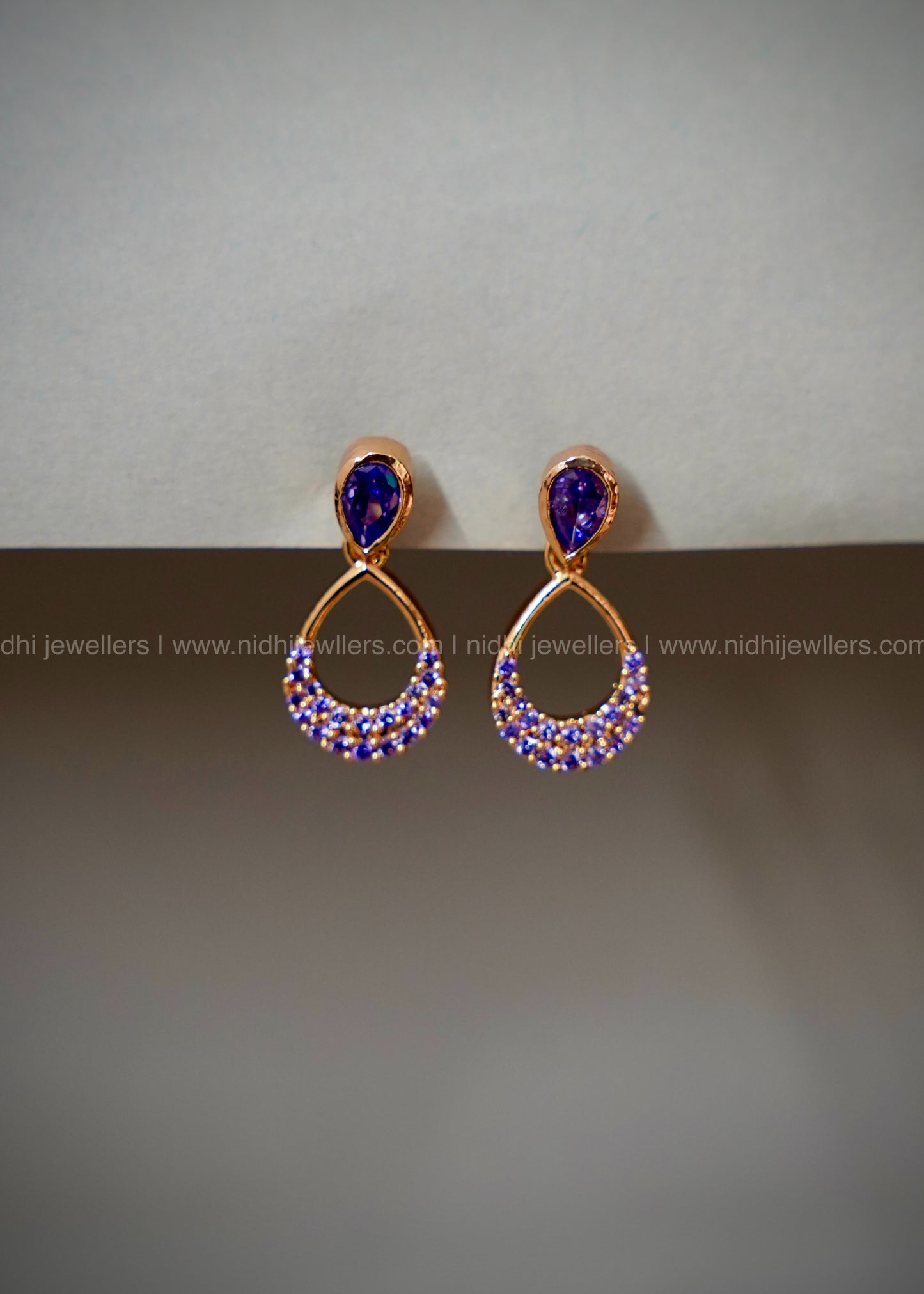 Dailywear  Blue micro stone oval earring.