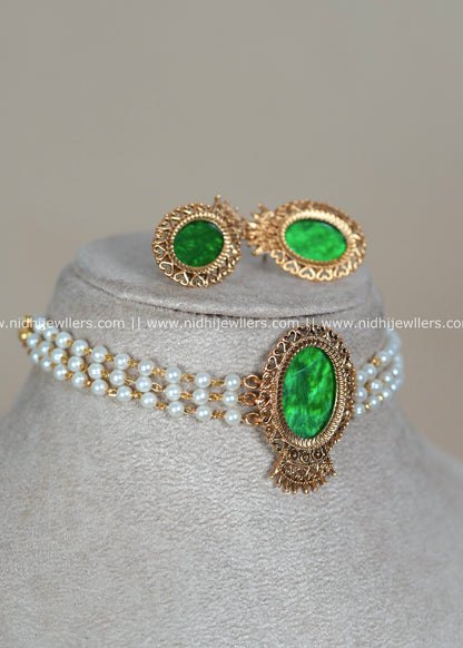 Antique Matte Three-Strand Pearl Choker Set with Oval Glass-Green Medallion - Vritika