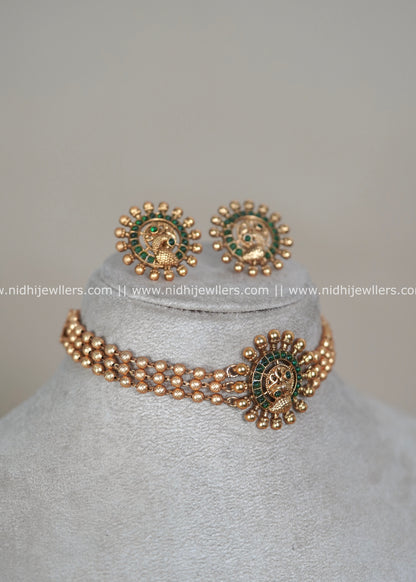 Antique Matte Three-Strand Bead Choker Set with Emerald Peacock Medallion - Ishani
