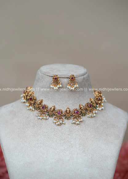 Antique Matte Lakshmi Temple Choker Set with Ruby and Emerald Accents - Shalini